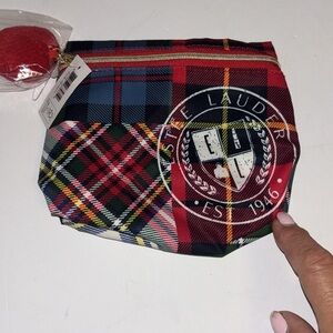 ESTEE LAUDER PLAID COSMETIC BAG WITH POM POM